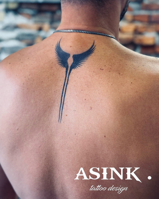 Symbol - čierne krídla
